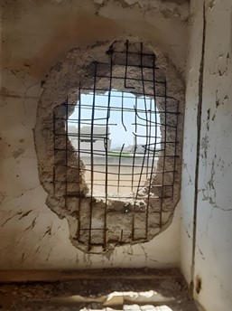 Figure 6. Severe Damage in the Load-Bearing Wall Caused by Direct Impact