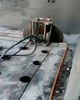 Figure 7. Creation of Slab Openings to Facilitate Concrete Casting During the Rehabilitation of the Damaged Load-Bearing Wall